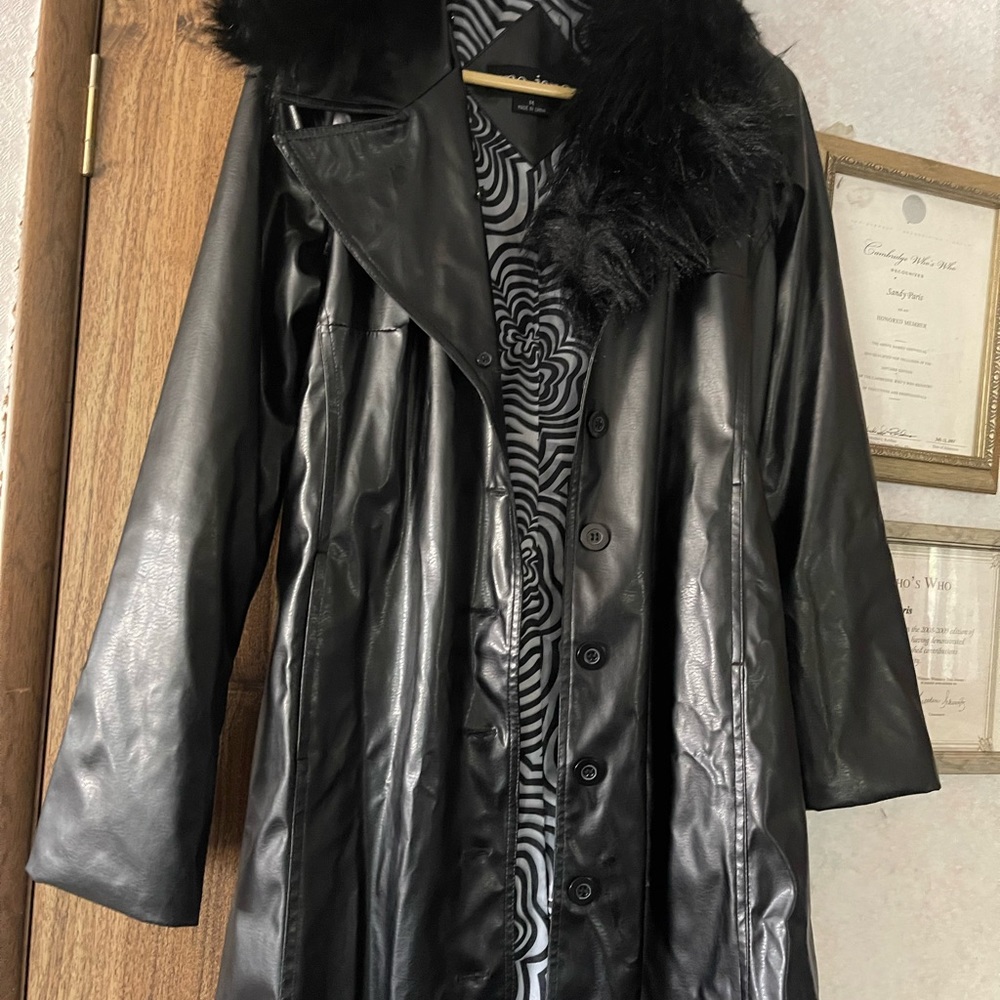 Me Jane size Medium knee length button down jacket.